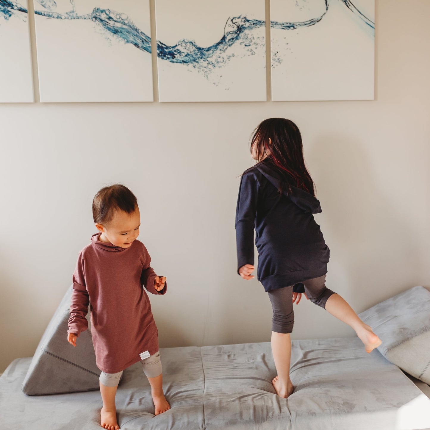 Eco-friendly kids' clothing – gender-neutral navy grow with me hoodie, sustainably made in Canada.