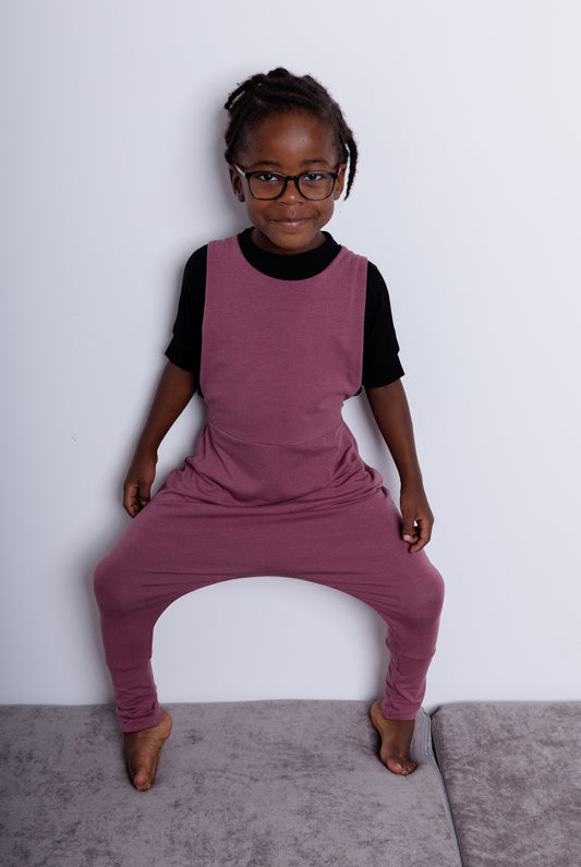 Rose brown grow-with-me overalls for toddlers and kids, made from soft, eco-friendly fabric. Adjustable straps and cuffs for a long-lasting fit. Ethically made in Canada.