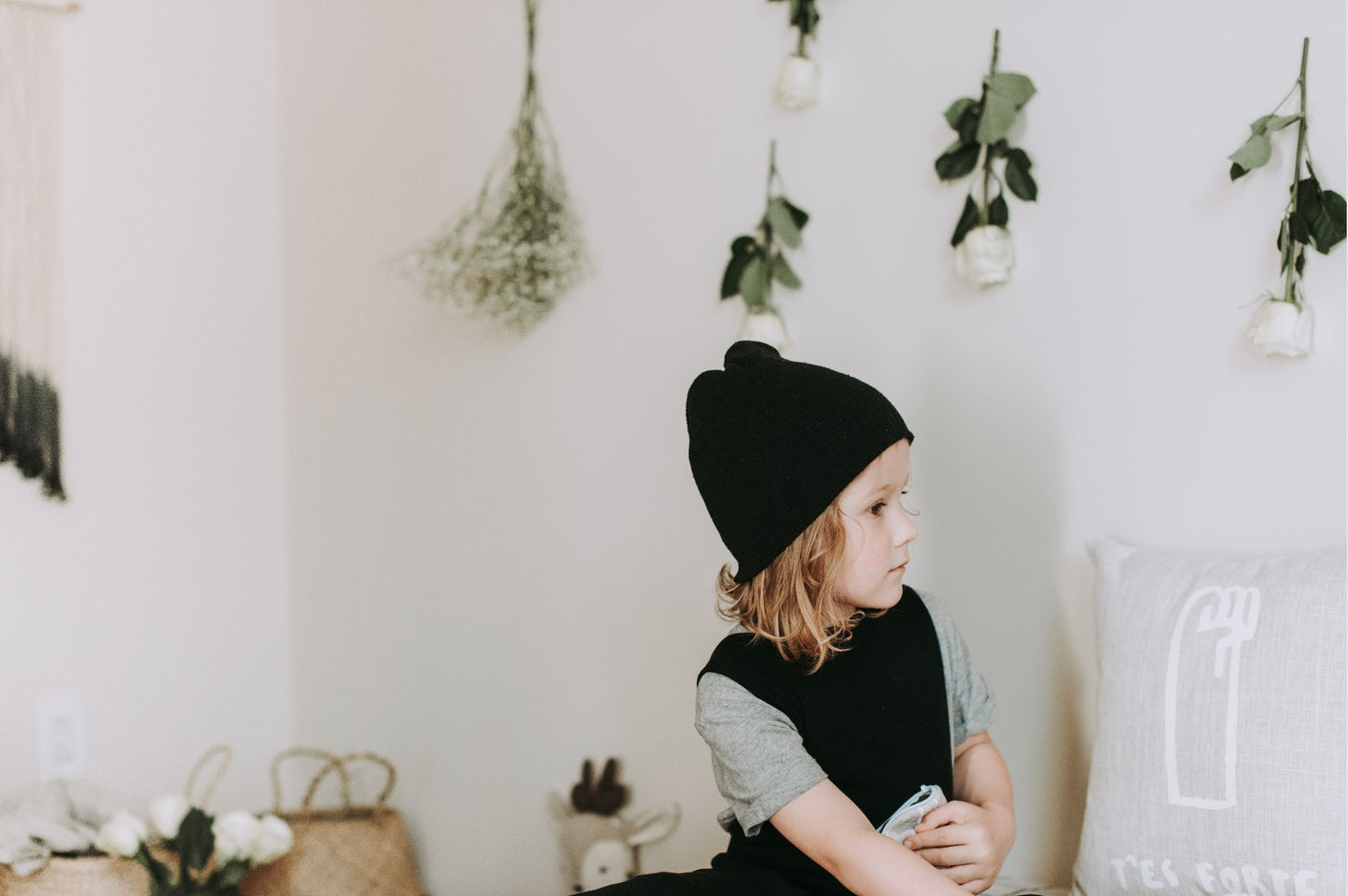 Soft and stretchy rose brown beanie for kids, made from eco-friendly fabric. Ethically crafted in Canada, featuring a fold-over brim and minimalist design
