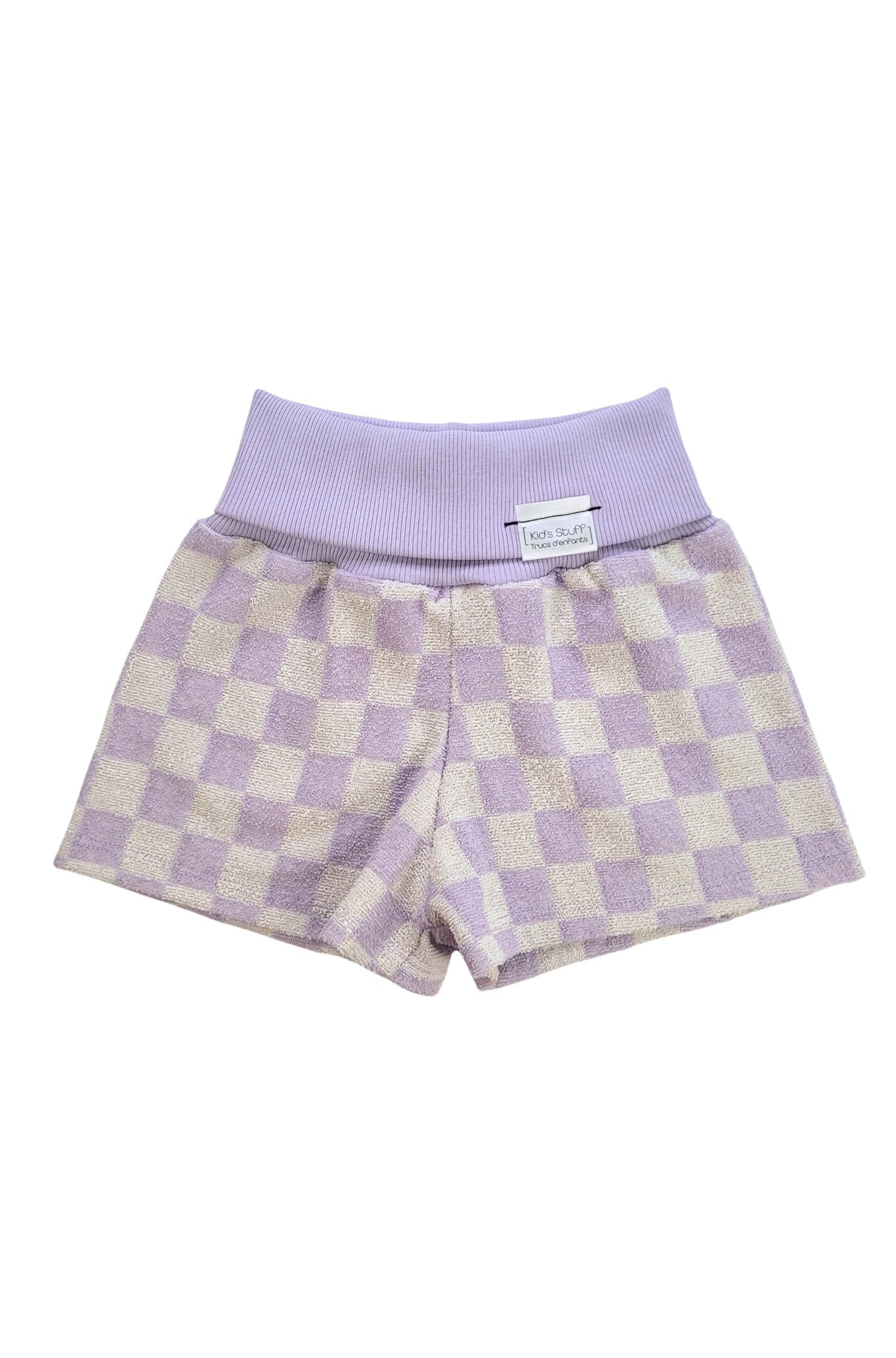 Discover our Grow-With-Me checkered shorts– gender-neutral, eco-friendly, and perfect for summer. Made from soft terry fabric, ideal after the beach, pool, or bath. Handmade in Montreal.