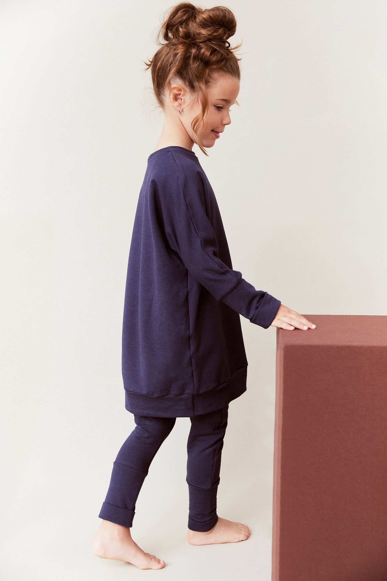 Eco-friendly kids' clothing – gender-neutral Navy grow with me sweater, sustainably made in Canada.