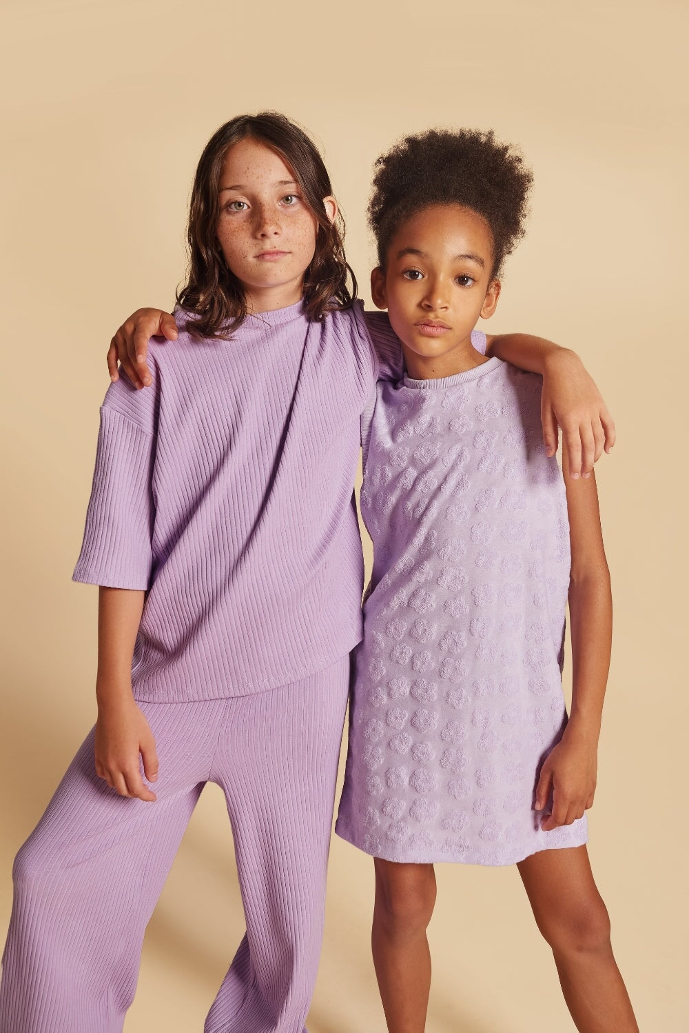 Discover our oversized Grow-With-Me T-Shirt – a gender-neutral, eco-friendly essential for kids. Handmade in Montreal, designed for comfort and longevity.