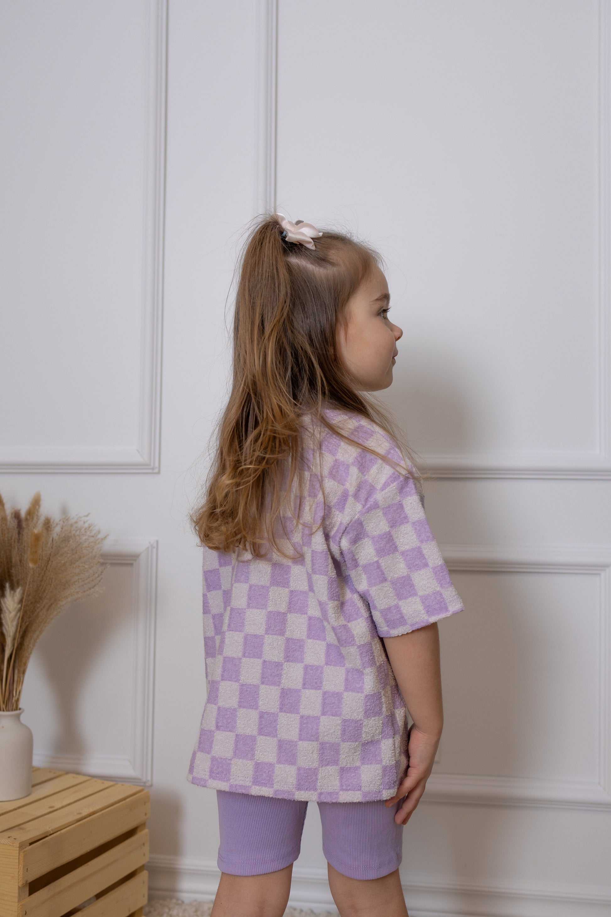 Checkered lilac oversize kids t-shirt made in Canada with eco-friendly fabric designed to grow with your child